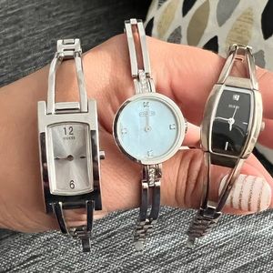 Watches… 2 guess watches and 1 coach.